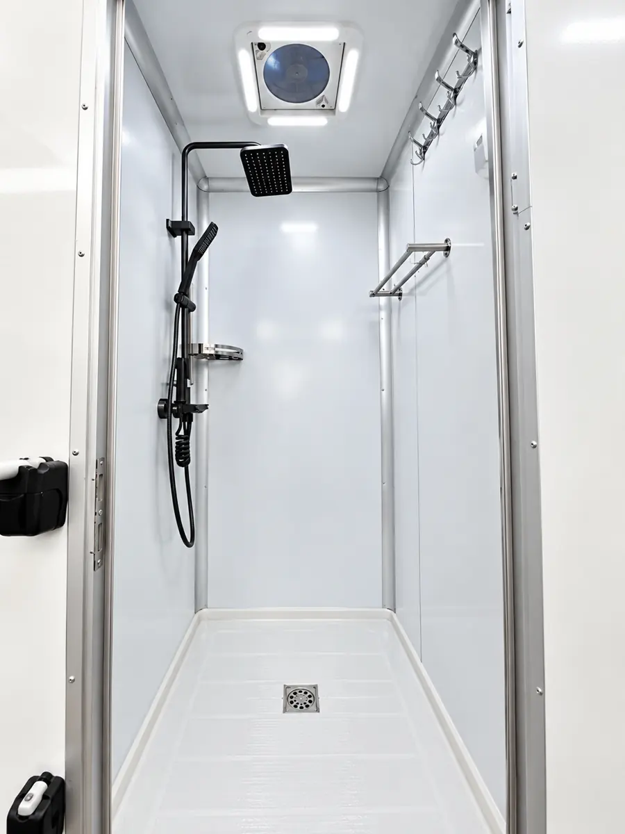 Inside a private shower stall in a mobile shower trailer